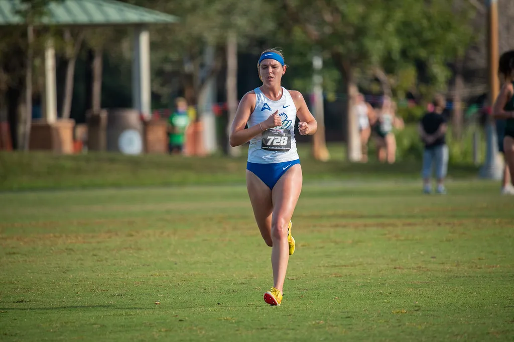 Emily OConnor, PT, DPT, running in a cross country race